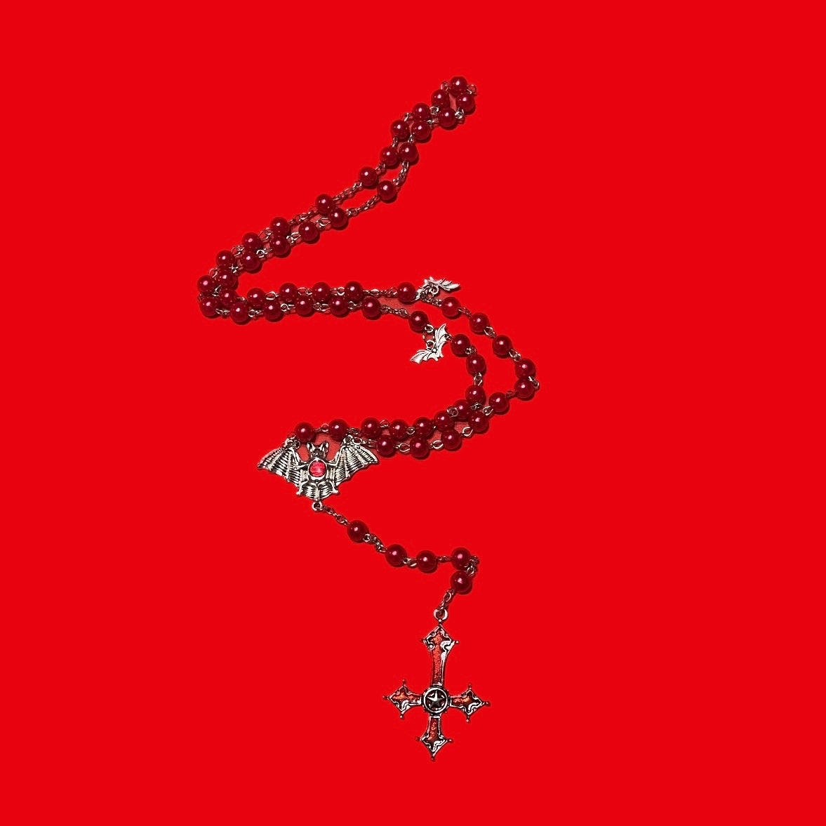 Sinful Red Inverted Cross Bat Rosary Necklace